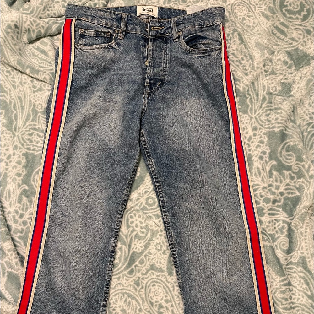 Zara denim jeans with red strips going the side of the leg. These are a size 38.